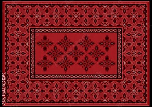 Luxury carpet with ethnic oriental ornament in red and burgundy shades
