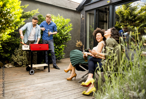 Sticker Friends grilling food and enjoying barbecue party outdoors