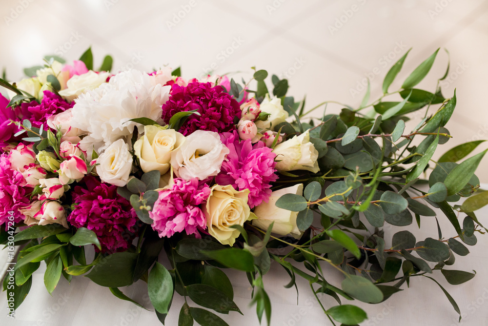 Wedding peony bouquet on table Wedding peony bouquet on table