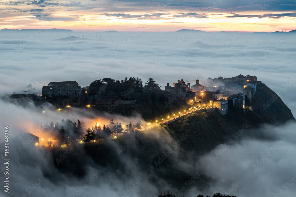A particularly attractive view of the Sicilian town, Polizzi Generosa when low cloud (the so-called maretta
