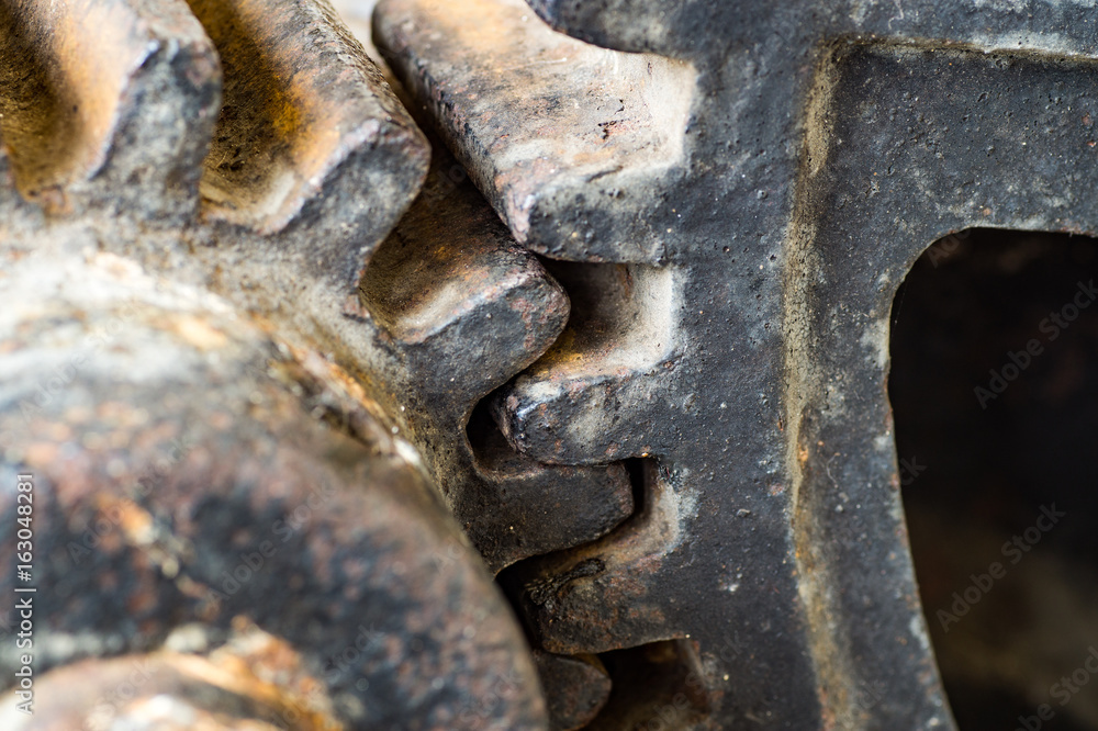 Detail of old rusty gears transmission wheels