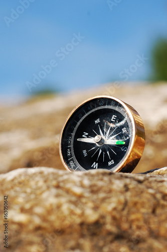 compass on the rock