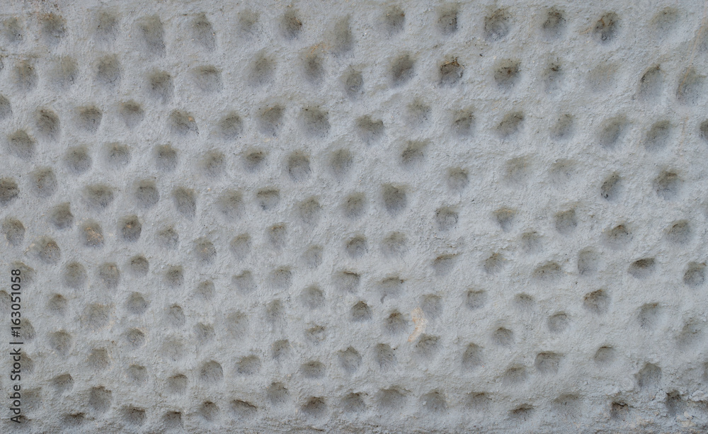 A stone wall panel with a deep pattern suitable for a background or texture A stone wall panel with a deep pattern suitable for a background or texture