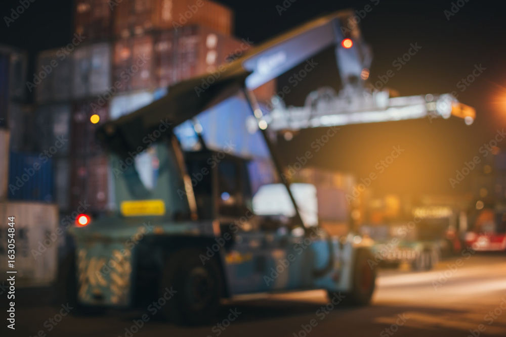 Loading and unloading of containers in the port ,blurred Loading and unloading of containers in the port ,blurred