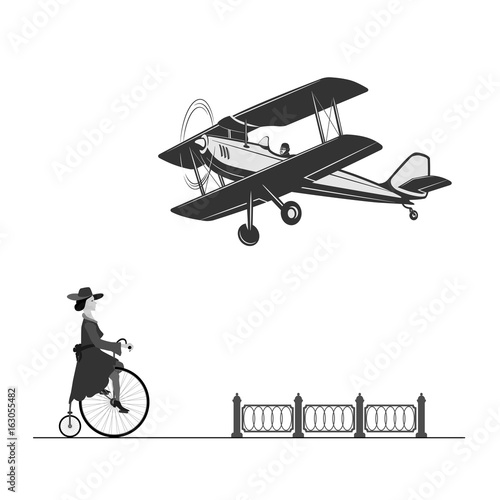 
The beautiful technique of our ancestors
A vintage airplane and a girl on an old bicycle.