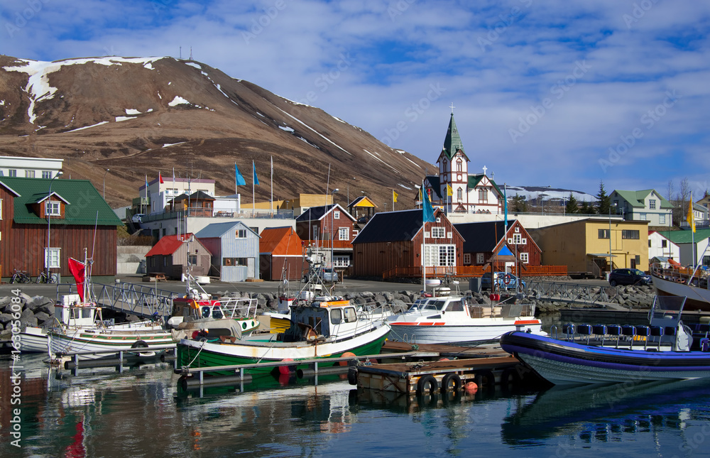 Icelandic Seaport: Boats for fishing and for whale watching tours gather at the port of Husavik, Iceland.