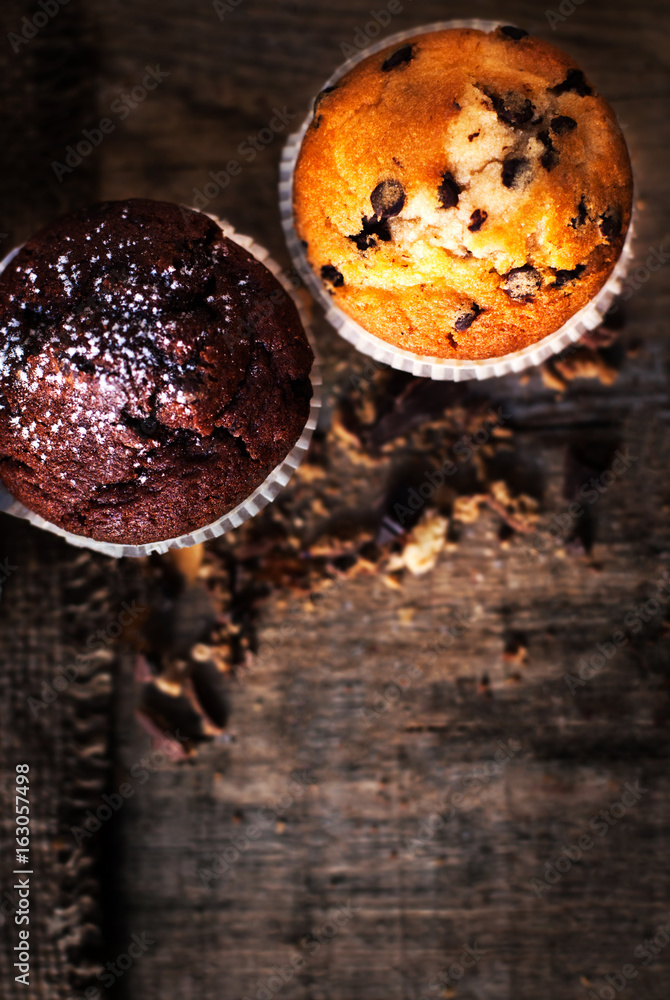 Muffins on dark background close up image, selective focus, macro. Muffins on dark background close up image, selective focus, macro.