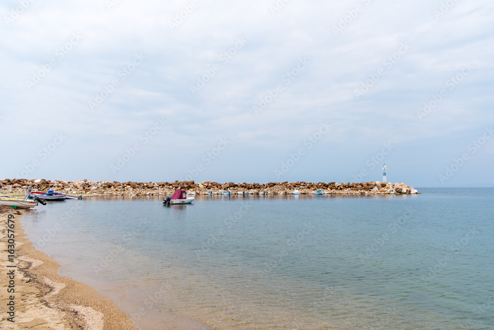 Small boats in a little harbor near Limenaria on greek island Thasos