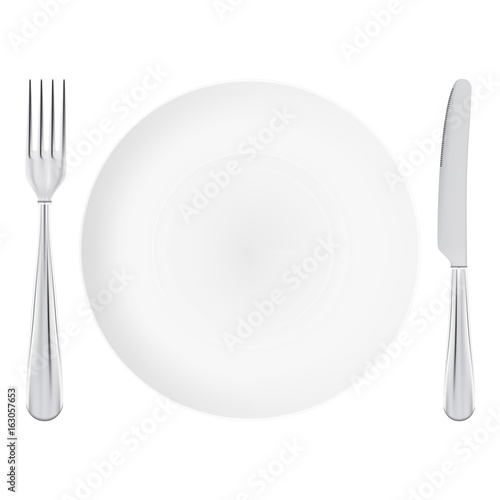 White Plate With Fork And Knife Crossed Isolated On A White Background.