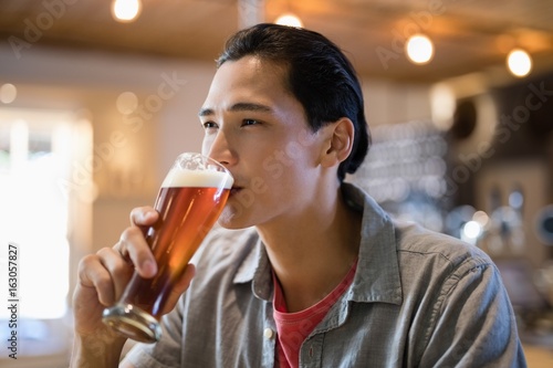 Man having beer in a restaurant