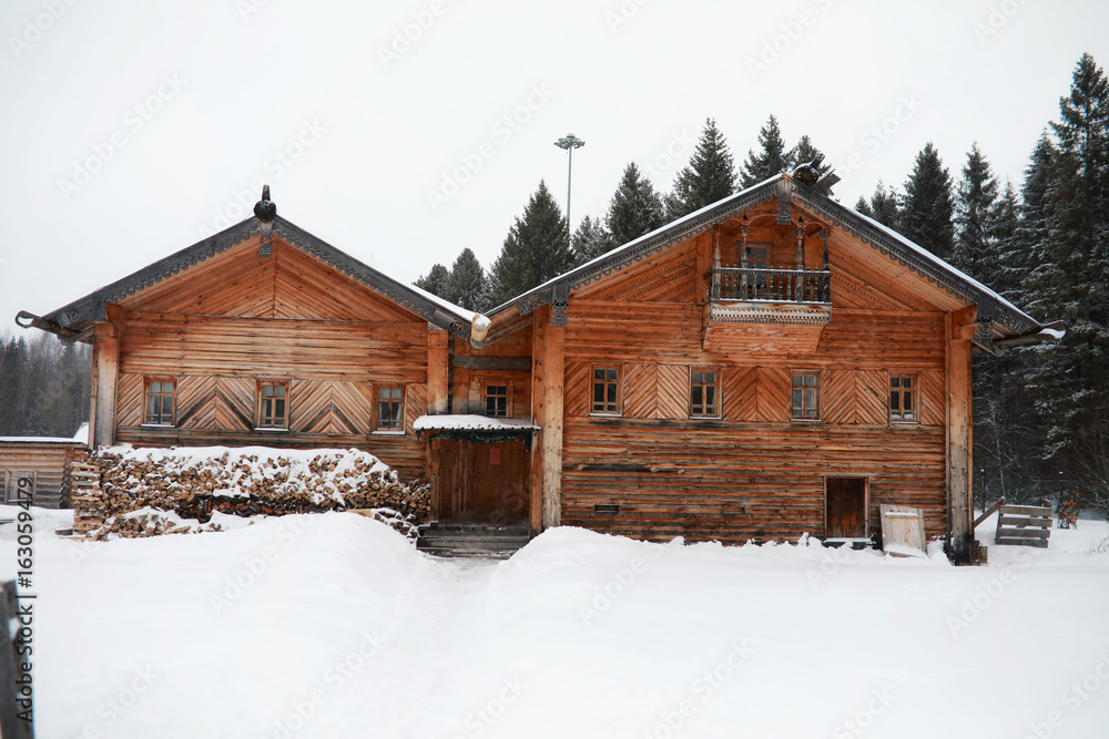 retro wooden house in the forest in russian north