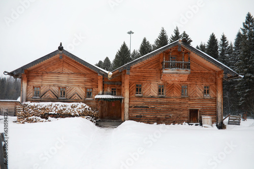 retro wooden house in the forest in russian north
