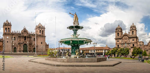 Panoramic view of Plaza de Armas with Inca fountain, Cathedral and Compania de Jesus Church - Cusco, Peru photo