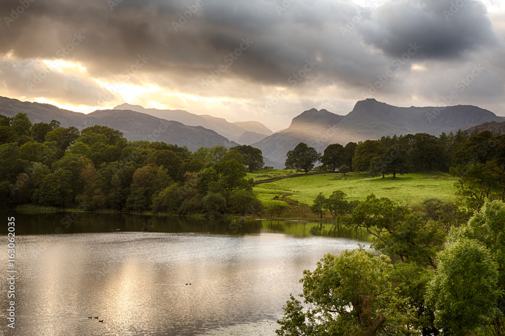 Naklejka premium Sunset at Loughrigg Tarn in Lake District