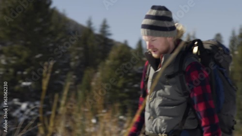 Wallpaper Mural Camera Pans From Right To Left With Backpacker Snowshoeing, His Friend Follows Behind Torontodigital.ca