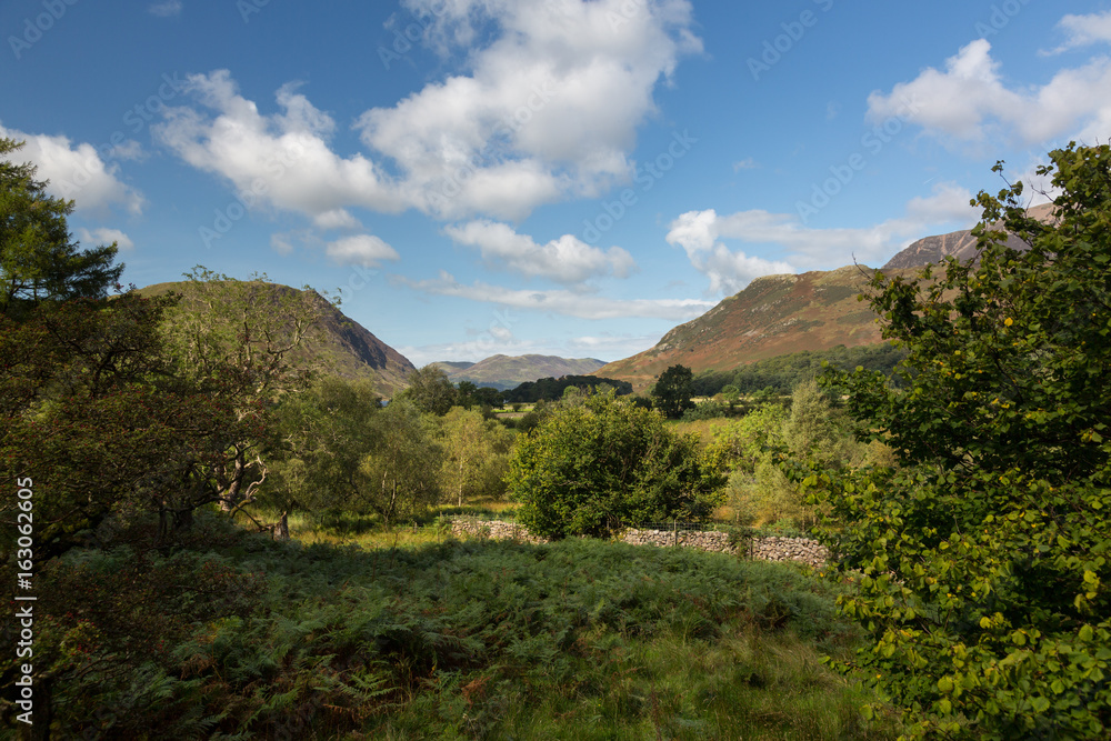 View over Buttermere village to distant hills View over Buttermere village to distant hills