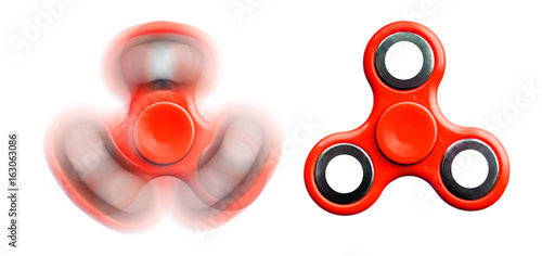 Red Fidget Spinner isolated on white background photo