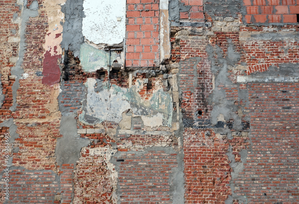 Obraz premium part of old derelict brick wall after demolition work