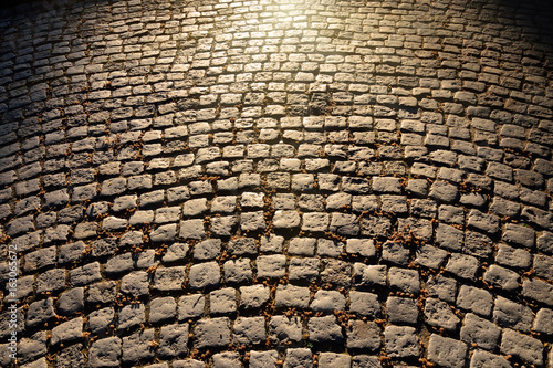 Vintage cobblestones glistening in the sun