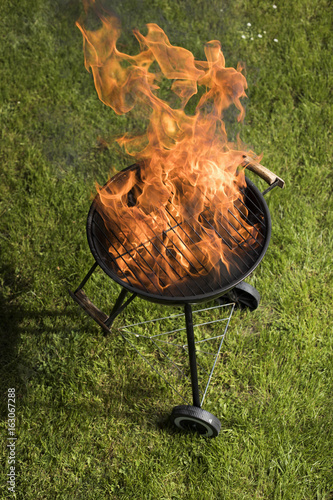 Concept of summer grilling, barbecue, fire background photo