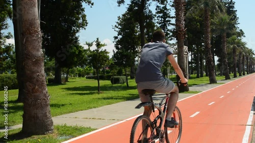 Cycling on a cycle path photo