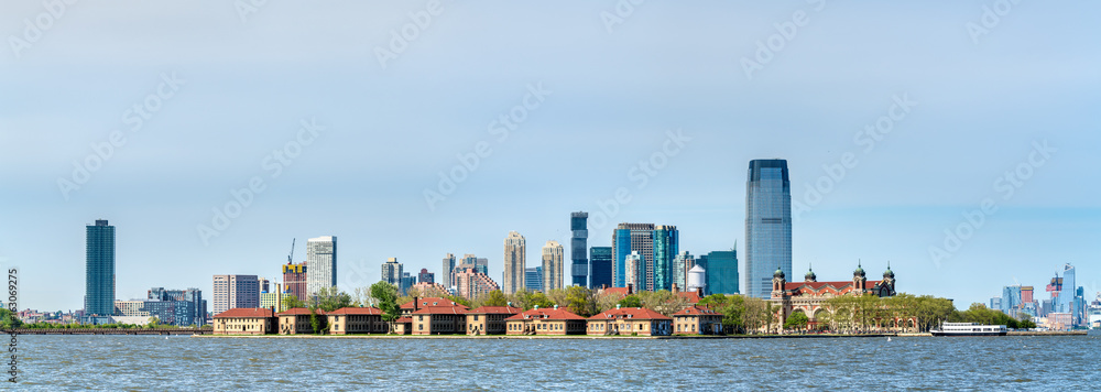 Ellis Island and skyscrapers of Jersey City, USA