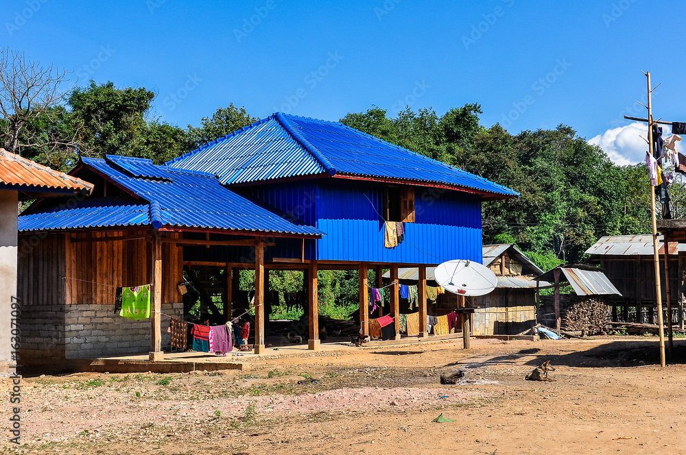Wooden houses in a small community near Muang Sing, Laos Wooden houses in a small community near Muang Sing, Laos
