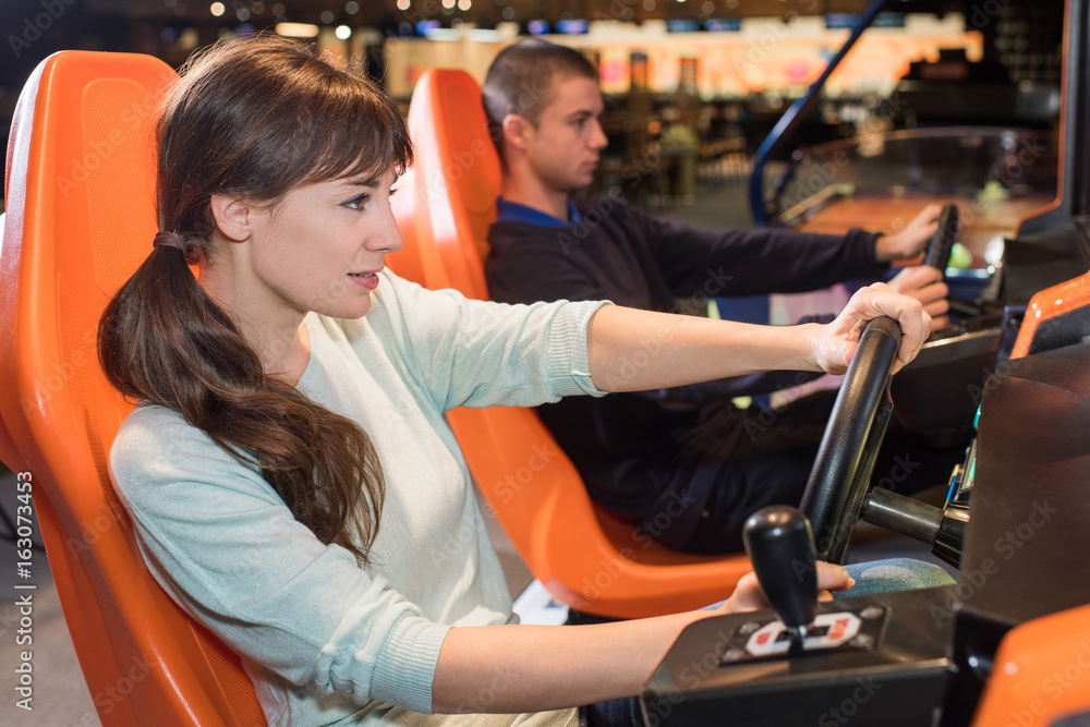 woman play the video game at recreational salon woman play the video game at recreational salon