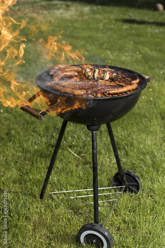 Grill with red hot briquettes, fire background Grill with red hot briquettes, fire background