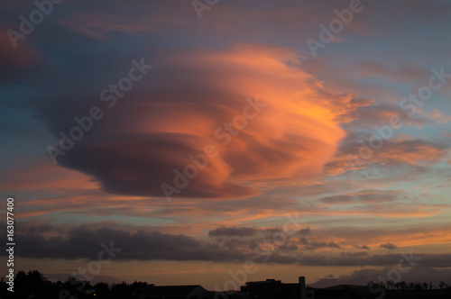 Lenticular cloud at sunset photo