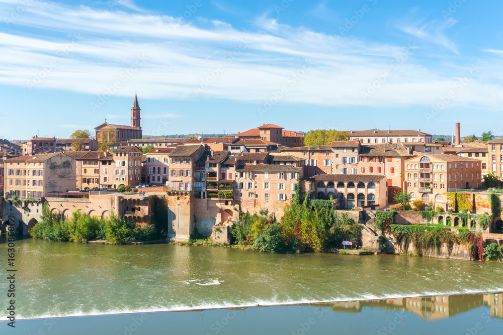 Obraz premium Albi in Southwestern France. Albi is a world heritage UNESCO site. View of the Tarn River and the Cathedral Saint Cecile.
