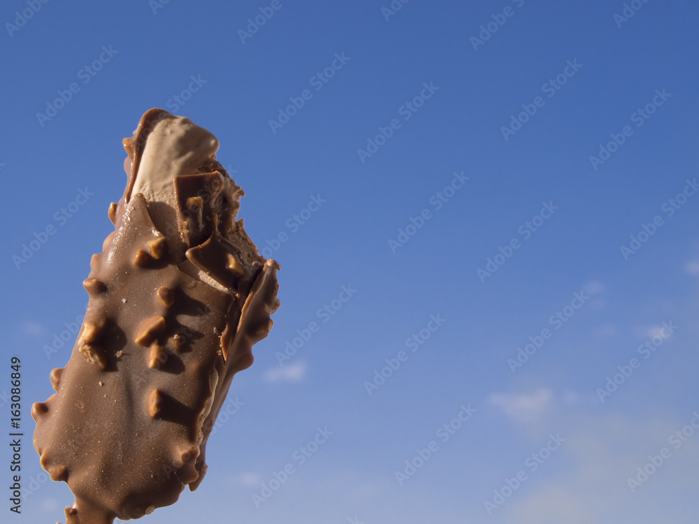 chocolate ice-cream on sky and clouds