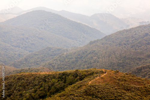 People on trekking in an isolated mountain in southern Brazil photo