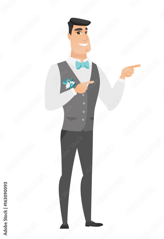 Young caucasian groom pointing to the side. Young caucasian groom pointing to the side.