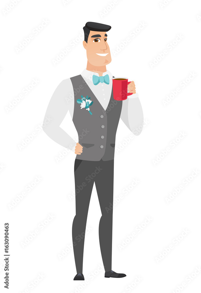 Young caucasian groom holding cup of coffee.