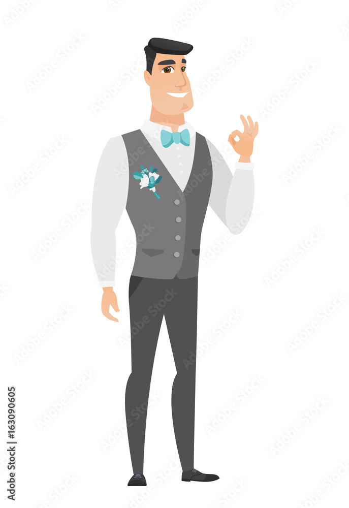 Smiling groom showing ok sign. Smiling groom showing ok sign.