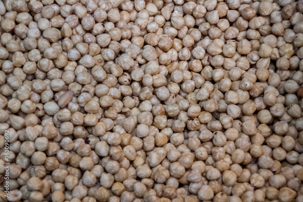 Background nuts, hazelnuts on a crowd, large amount of hazelnuts, healthy food Background nuts, hazelnuts on a crowd, large amount of hazelnuts, healthy food