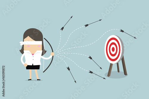 Blindfold businesswoman with bow and arrow misses the target. vector