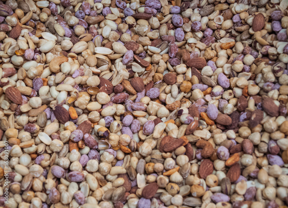 Background nuts, walnut, pistachios, peanuts, hazelnut, Indian nut, on a bunch, healthy food Background nuts, walnut, pistachios, peanuts, hazelnut, Indian nut, on a bunch, healthy food