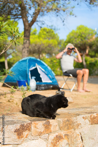 Man alone with tent for adventure camping