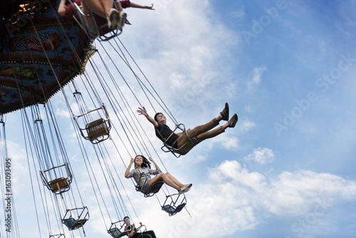 Swing Spining Amusement Carninal Enjoyment Concept photo