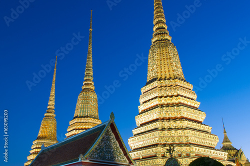 Pagoda in Wat Pho at Thailand at twiligth photo