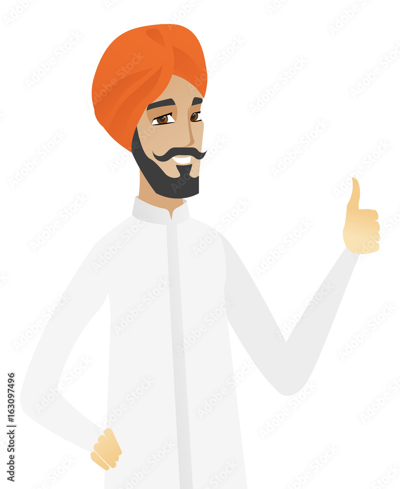 Young hindu businessman giving thumb up.