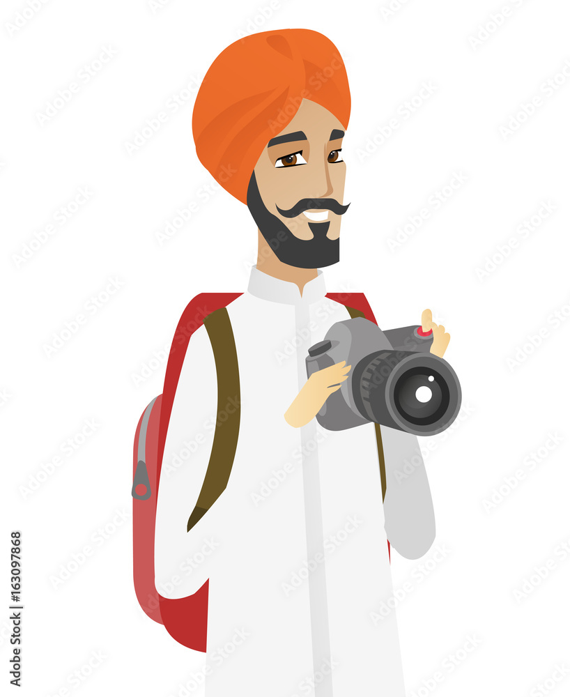Hindu nature photographer with digital camera. Hindu nature photographer with digital camera.