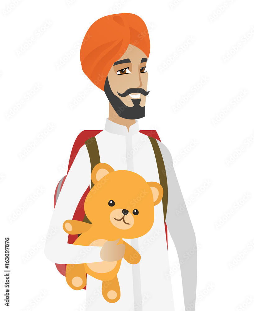 Hindu traveler man holding teddy bear. Hindu traveler man holding teddy bear.