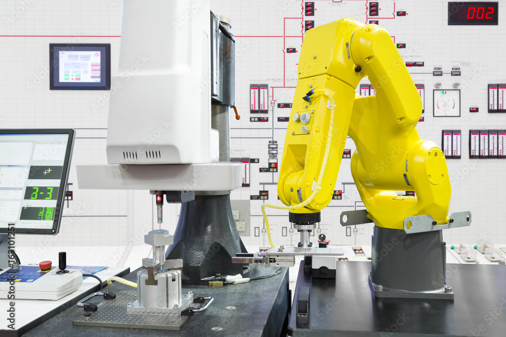 Automated robotic picking automotive part in smart factory, Industry 4.0 concept Automated robotic picking automotive part in smart factory, Industry 4.0 concept