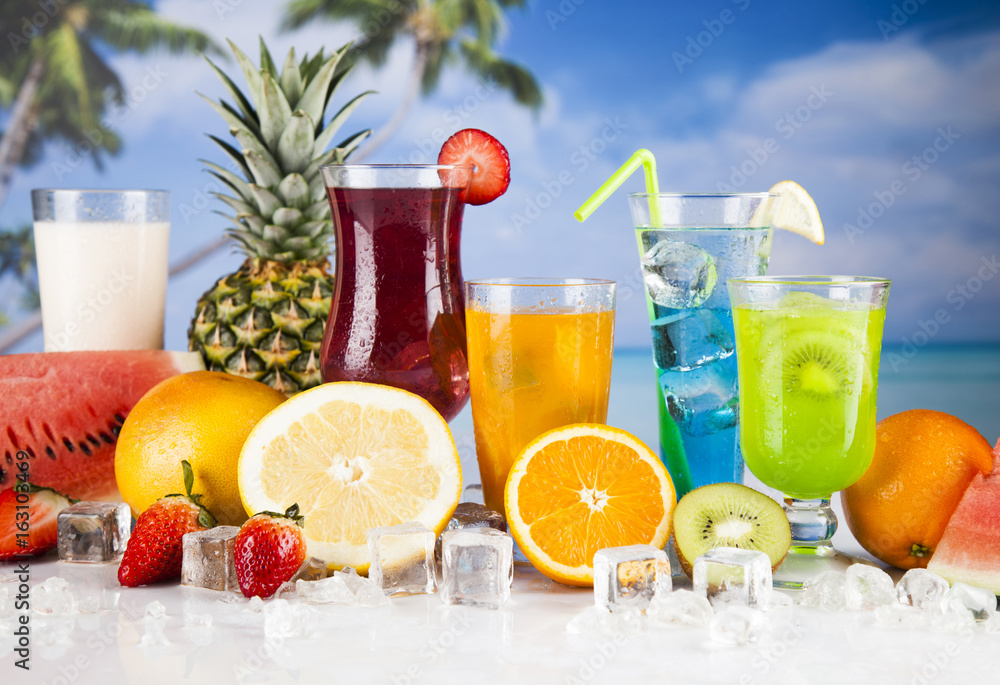 Cocktails in front of beach and sea Cocktails in front of beach and sea