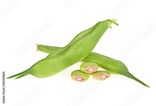 Fresh young pods of beans with beans on white background