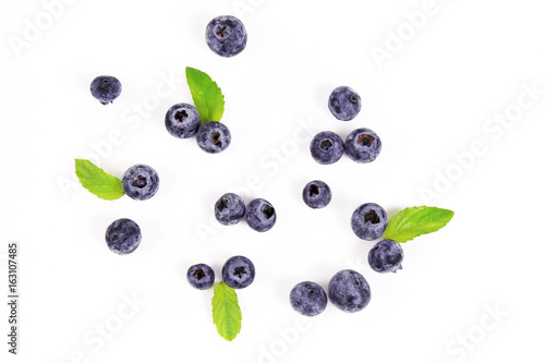 Fresh blueberry with leaf on white background