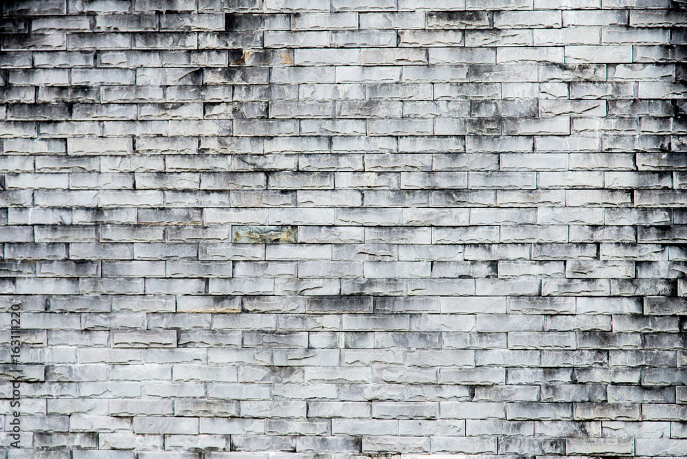 old gray brick wall texture background.Rough brick wall.Background of old vintage dirty brick wall with peeling plaster, texture old gray brick wall texture background.Rough brick wall.Background of old vintage dirty brick wall with peeling plaster, texture